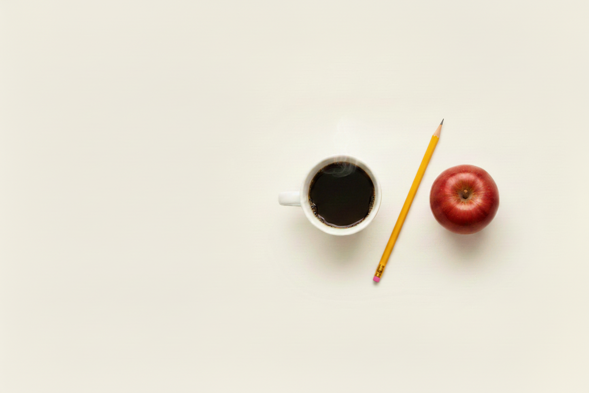 Coffee cup, 45-degree pencil, and apple banner